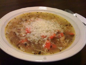 Cannellini Bean Soup served with Parmesan cheese and a drizzle of olive oil