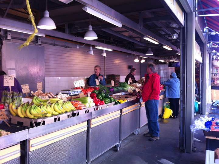 Shoppers selecting produce