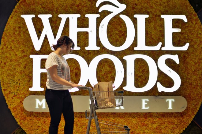 Whole Foods logo with shopper