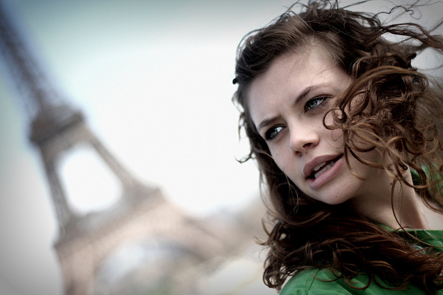 Woman in Paris with Eiffel Tower in background