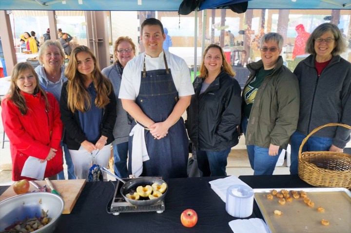 Heather Fink with Joe the Baker and the library staff