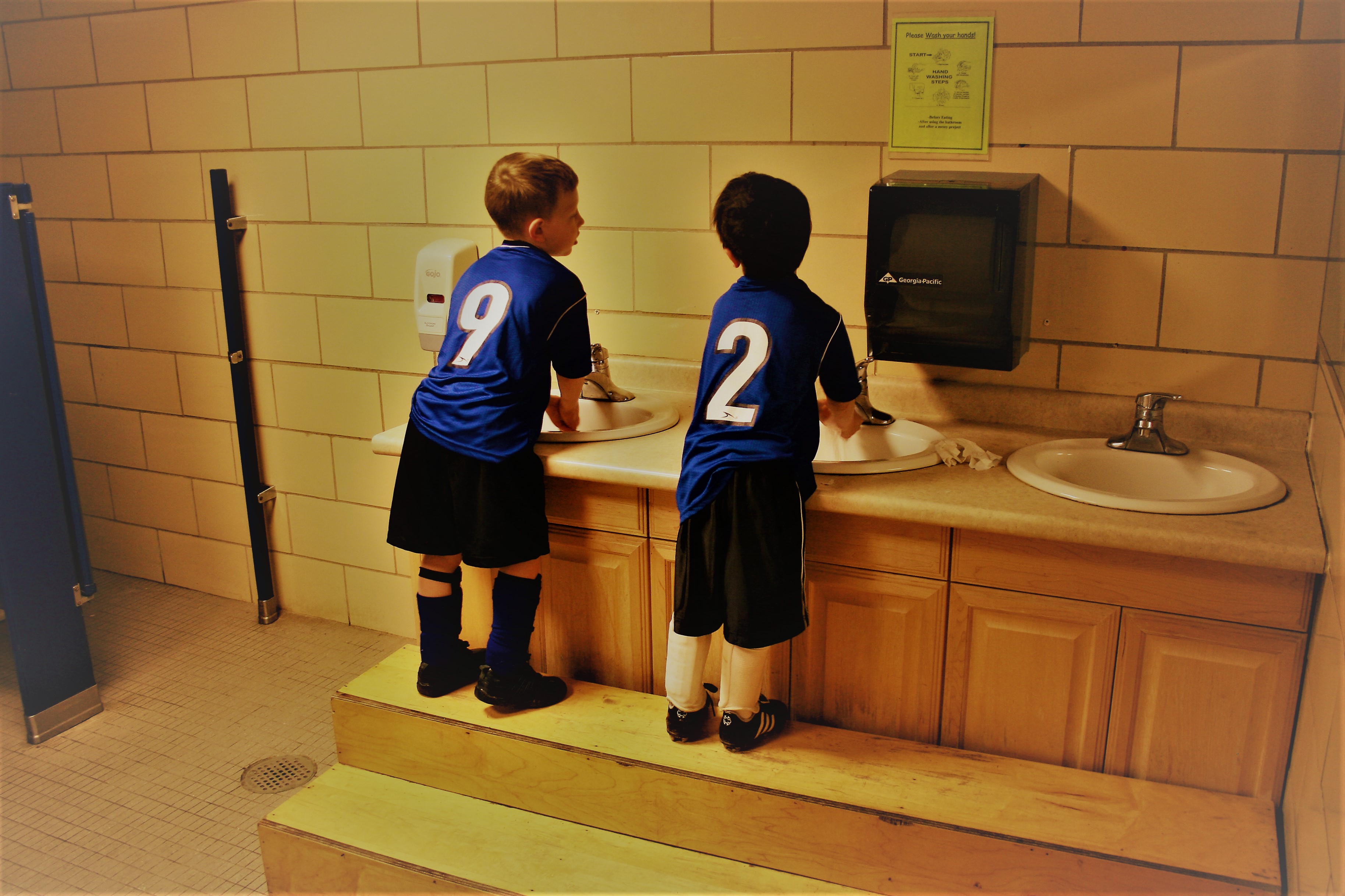 Boys washing hands