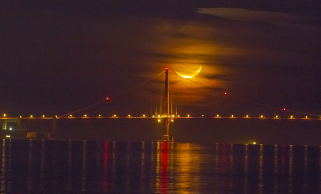 Crescent moon over Golden Gate Bridge