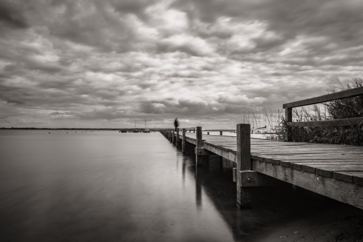 Woman on the sea bridge