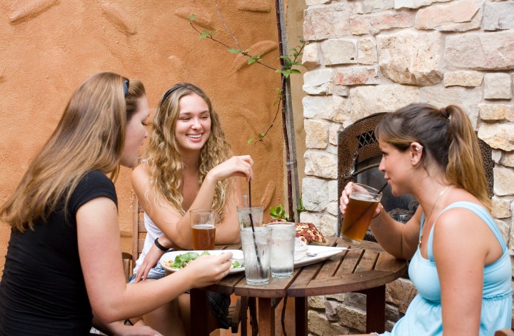 Three girls sharing lunch
