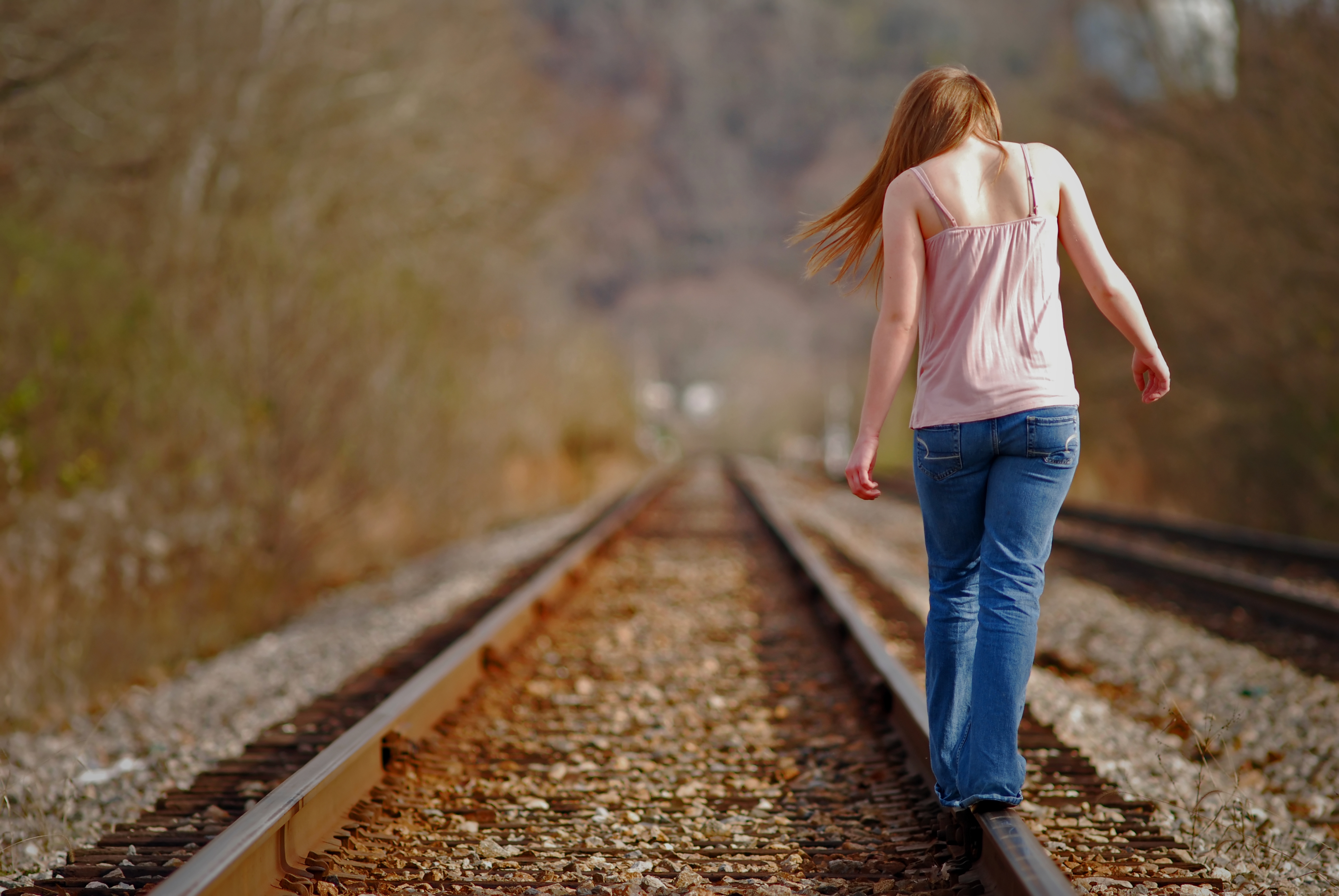 Girl on tracks