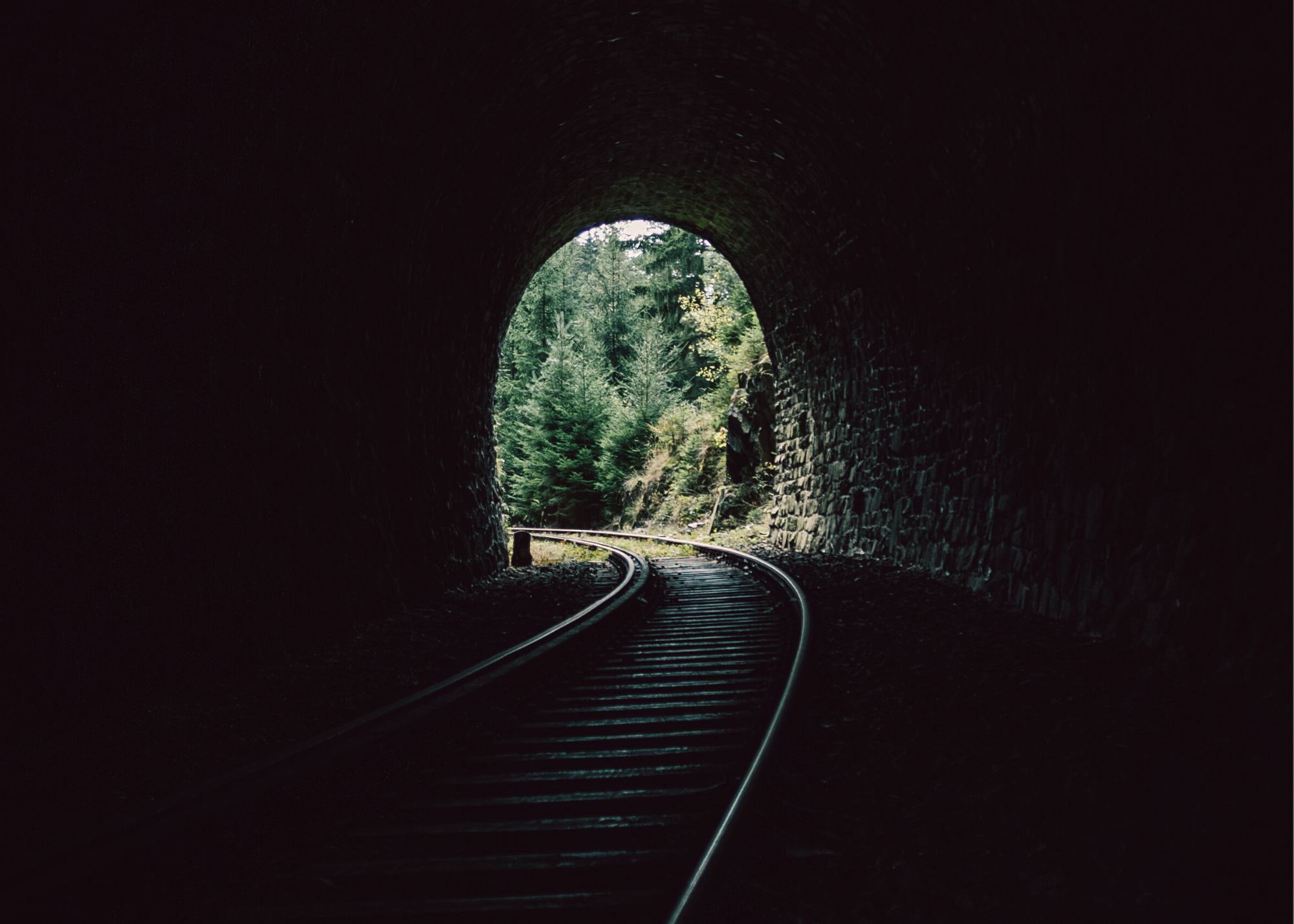 Railroad tracks in tunnel