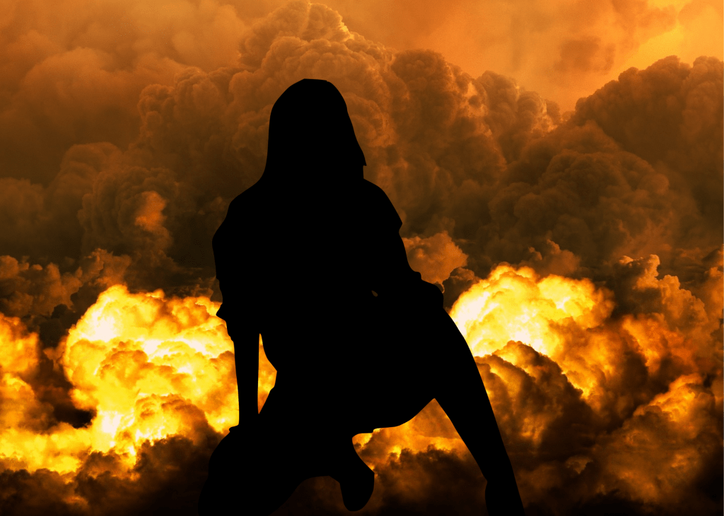 Woman silhouette in front of explosion