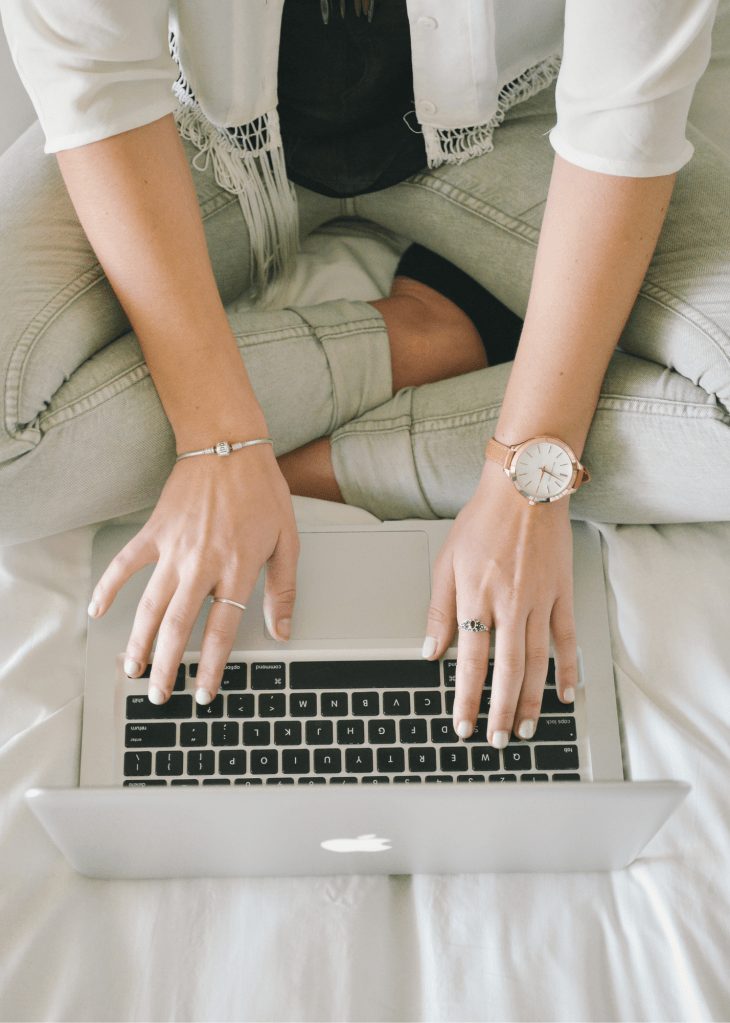 Woman typing on computer