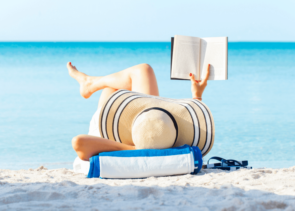 Woman reading on beach