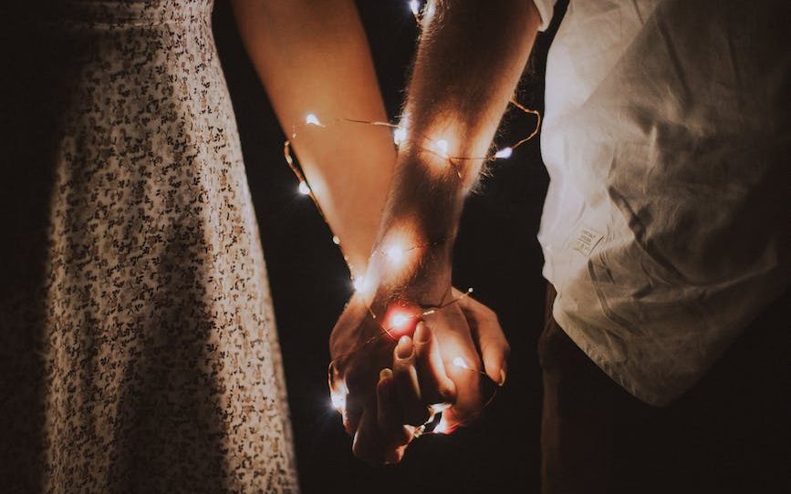 Couple holding hands